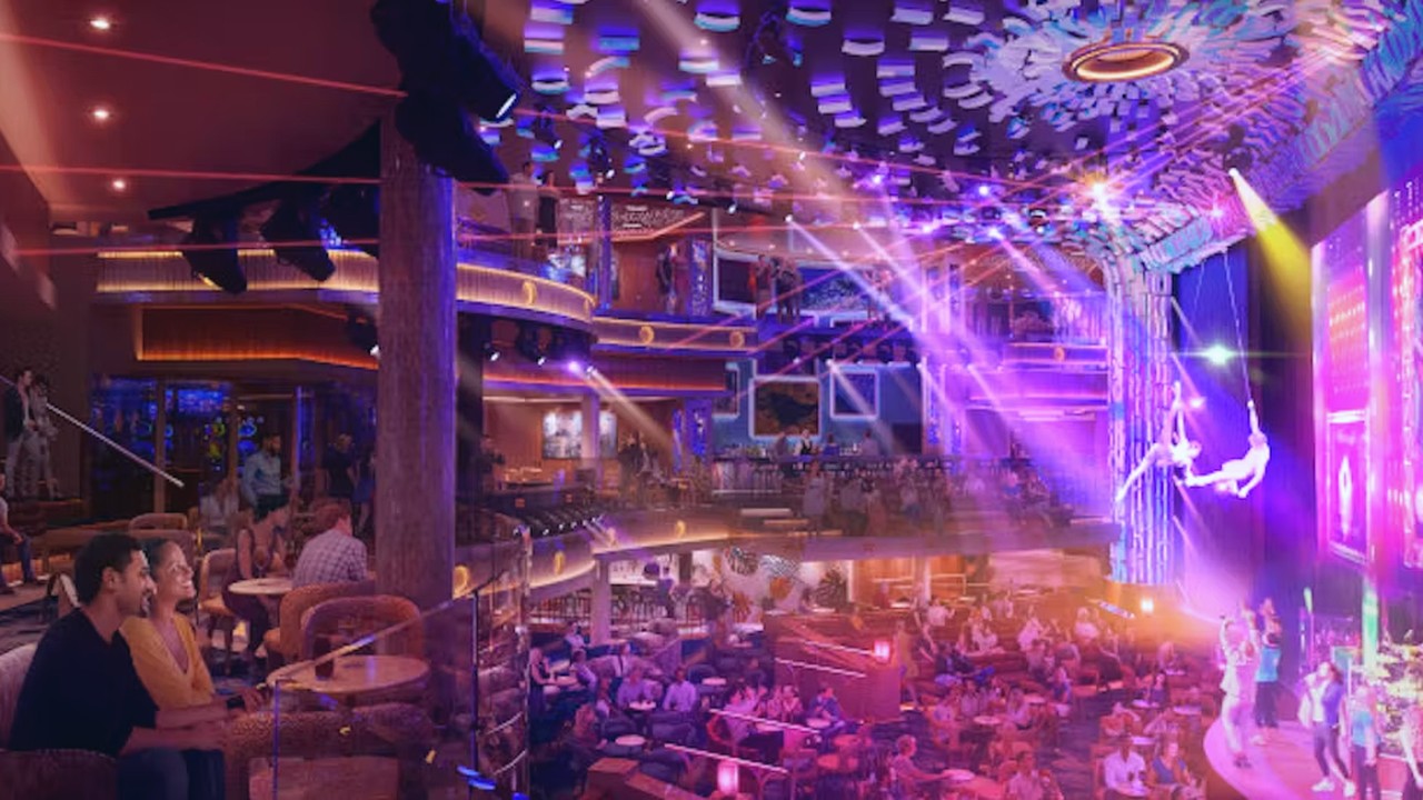 Cruise ship venue rendering with lighting beams and audience